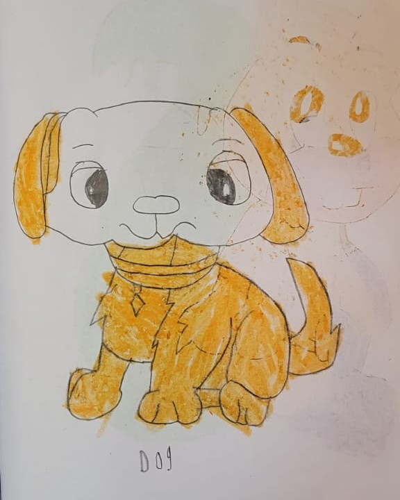 A learner’s coloured pencil drawing of a puppy, labelled “Dog”
